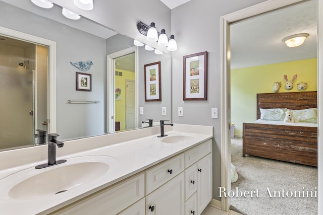 6374 Blakely Dr NE, Rockford, MI 49341 - ensuite bathroom featuring double vanity and a shower stall