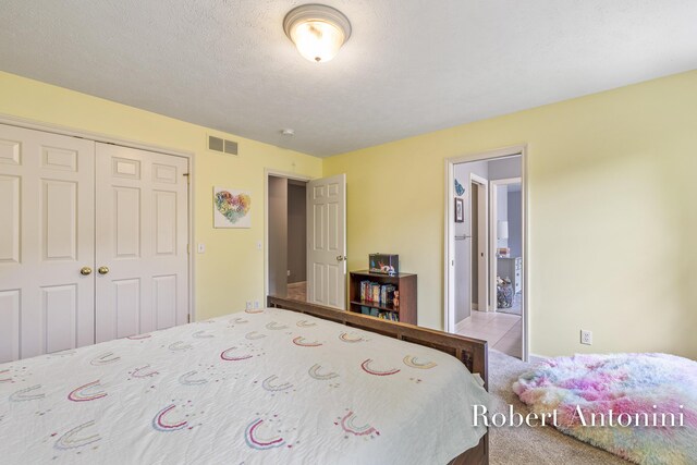 6374 Blakely Dr NE, Rockford, MI 49341 - bedroom with a closet, carpet floors, and baseboards