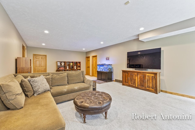 6374 Blakely Dr NE, Rockford, MI 49341 - living area with recessed lighting, carpet floors, baseboards, and a textured ceiling
