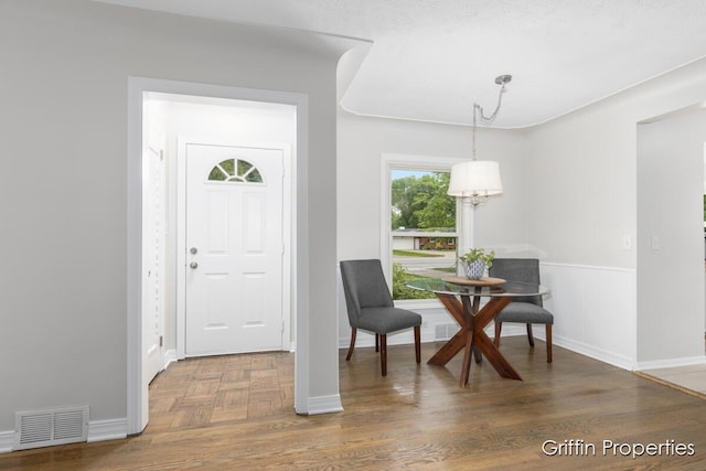 3020 Cascade Rd SE, Grand Rapids, MI 49506 - entryway with wood finished floors and baseboards