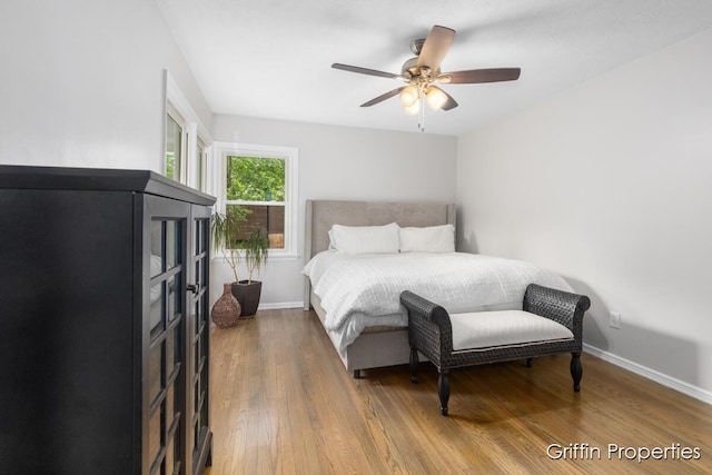 3020 Cascade Rd SE, Grand Rapids, MI 49506 - bedroom featuring wood finished floors, baseboards, and a ceiling fan