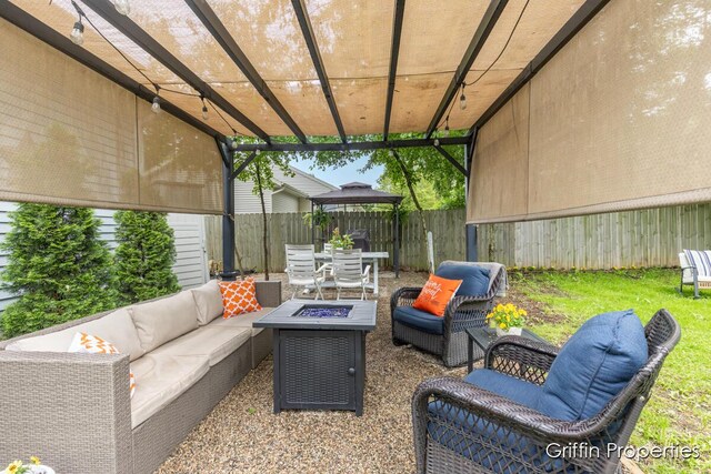 3020 Cascade Rd SE, Grand Rapids, MI 49506 - fenced backyard with an outdoor living space with a fire pit, a pergola, and a gazebo