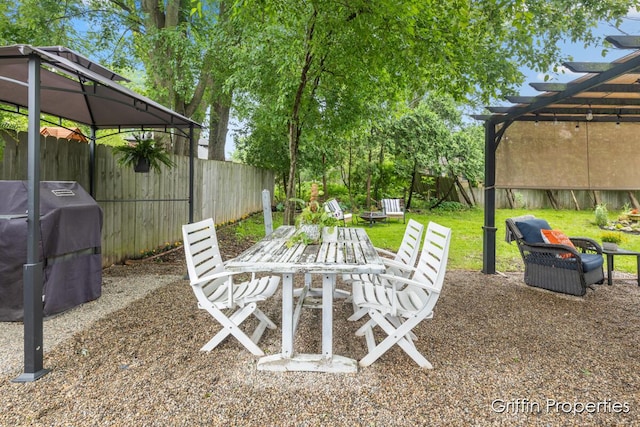 3020 Cascade Rd SE, Grand Rapids, MI 49506 - view of patio with a gazebo, a pergola, and a grill