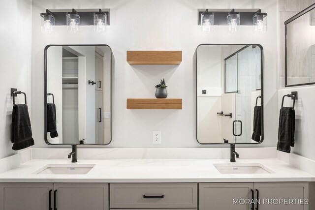 12607 76th Ave, Allendale, MI 49401 - bathroom with double vanity and a stall shower