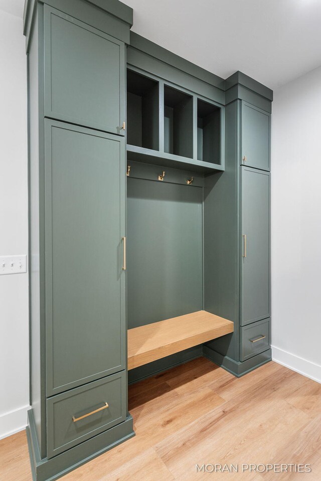12607 76th Ave, Allendale, MI 49401 - mudroom featuring light wood-style floors and baseboards