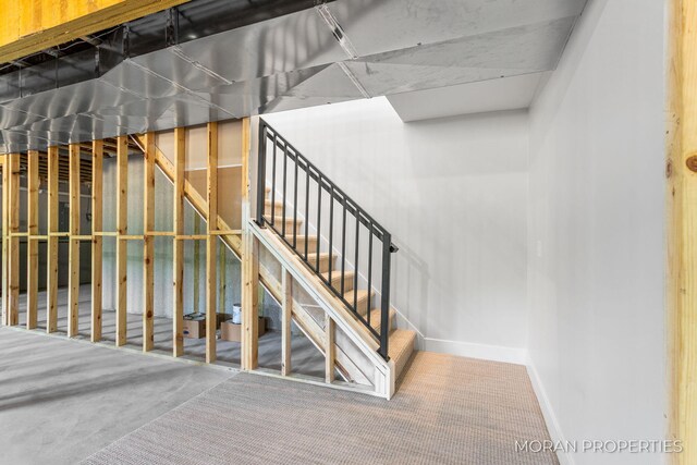 12607 76th Ave, Allendale, MI 49401 - staircase with baseboards and carpet flooring