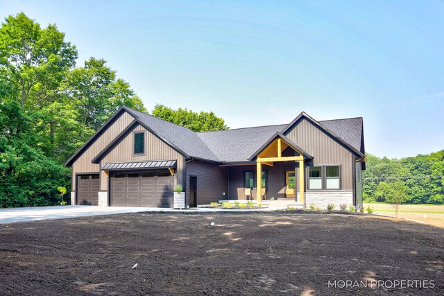12607 76th Ave, Allendale, MI 49401 - modern farmhouse style home featuring stone siding, driveway, board and batten siding, and roof with shingles
