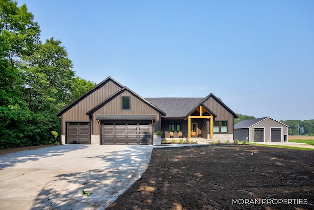 12607 76th Ave, Allendale, MI 49401 - modern farmhouse featuring driveway, stone siding, and a garage