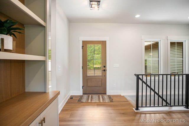 12607 76th Ave, Allendale, MI 49401 - entryway with light wood-type flooring, baseboards, and recessed lighting