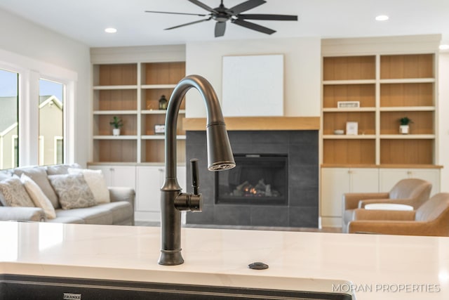 12607 76th Ave, Allendale, MI 49401 - living room featuring ceiling fan, a fireplace, recessed lighting, and built in shelves