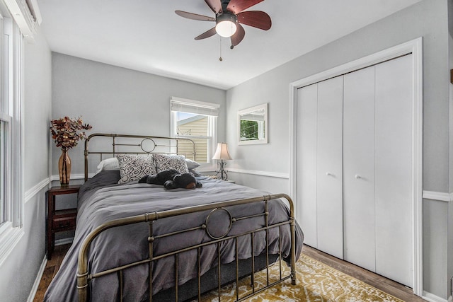2700 Norfolk Rd SE, Grand Rapids, MI 49506 - bedroom with wood finished floors, a closet, and ceiling fan