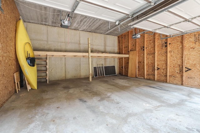125 Wa Wee Nork Dr Unit 109-5-A, Battle Creek, MI 49015 - garage featuring a garage door opener