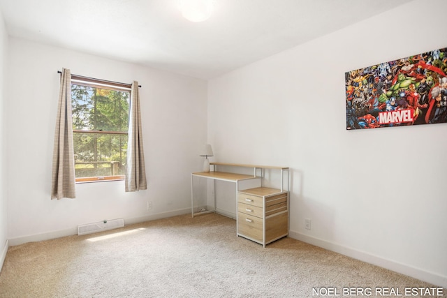 1710 Dykhouse Ave, Grand Haven, MI 49417 - unfurnished bedroom with light colored carpet and baseboards