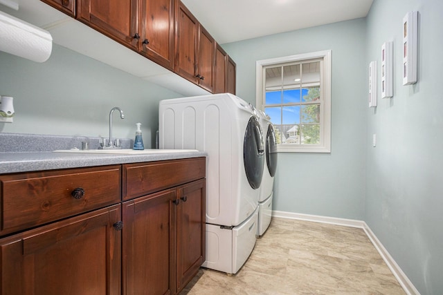 1415 Blackhawk Trl, Benton Harbor, MI 49022 - laundry area with washing machine and dryer and cabinet space