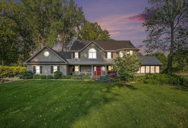 1415 Blackhawk Trl, Benton Harbor, MI 49022 - view of front of home with covered porch and a yard