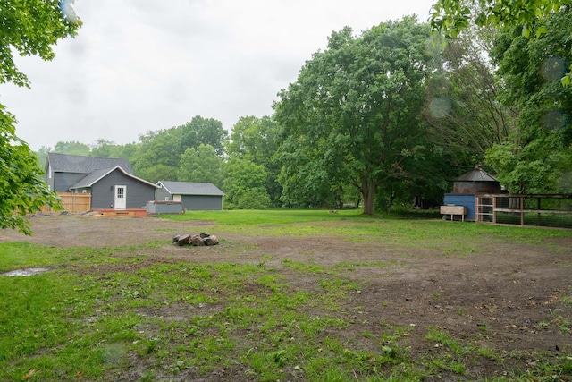 67679 Union Rd, Union, MI 49130 - view of yard with an outbuilding, exterior structure, and a wooden deck