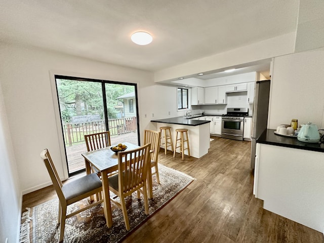 7362 30th St SE, Ada, MI 49301 - dining room with dark wood finished floors