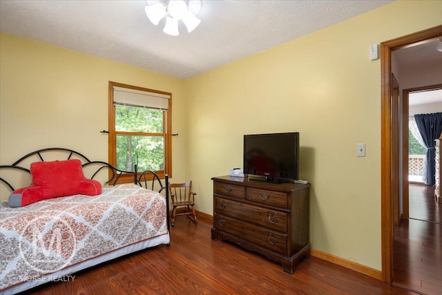 9057 Vergennes St SE, Ada, MI 49301 - bedroom featuring wood finished floors and baseboards