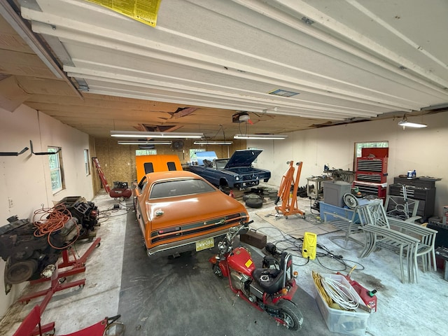 9057 Vergennes St SE, Ada, MI 49301 - garage featuring a garage door opener