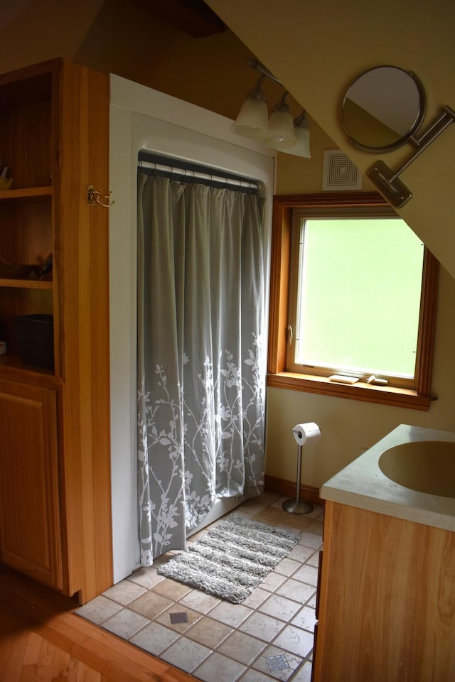 226 N 176th Ave, Walkerville, MI 49459 - full bath with vanity and curtained shower