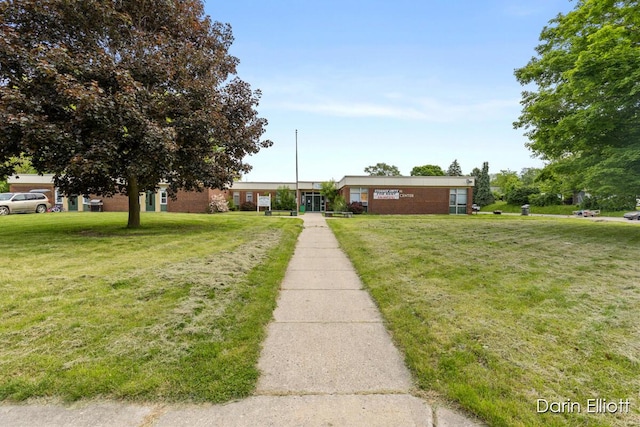 306 W Russell St, Hubbardston, MI 48845 - ranch-style home featuring a front yard