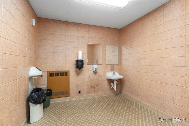 306 W Russell St, Hubbardston, MI 48845 - bathroom featuring heating unit