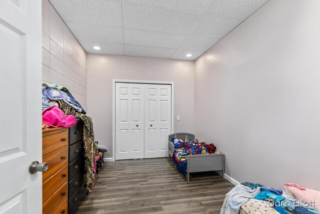 306 W Russell St, Hubbardston, MI 48845 - recreation room with wood finished floors, a paneled ceiling, recessed lighting, and baseboards