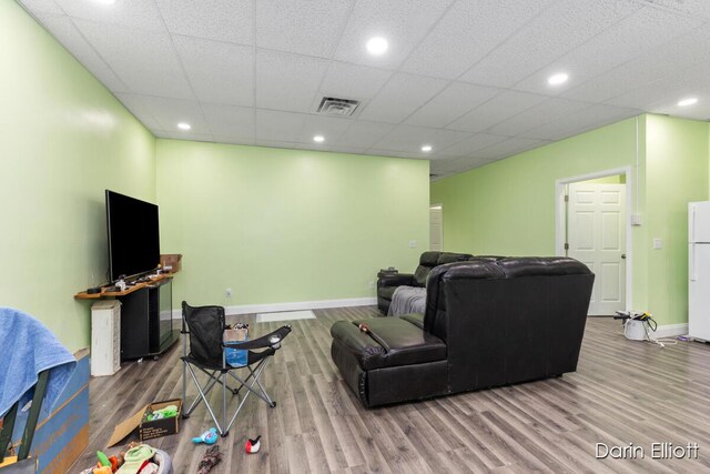 306 W Russell St, Hubbardston, MI 48845 - living room with wood finished floors, baseboards, and recessed lighting