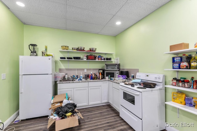 306 W Russell St, Hubbardston, MI 48845 - kitchen featuring white appliances, open shelves, dark wood-type flooring, recessed lighting, and white cabinetry
