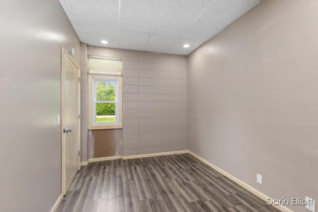 306 W Russell St, Hubbardston, MI 48845 - unfurnished room featuring baseboards, wood finished floors, and recessed lighting