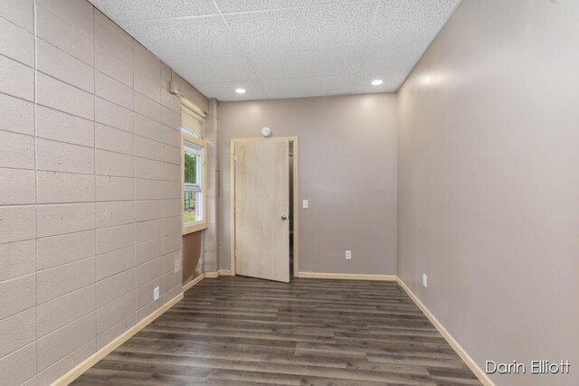 306 W Russell St, Hubbardston, MI 48845 - spare room with recessed lighting, dark wood-style flooring, and baseboards