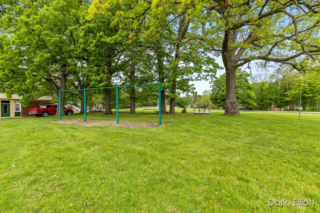 306 W Russell St, Hubbardston, MI 48845 - view of green lawn