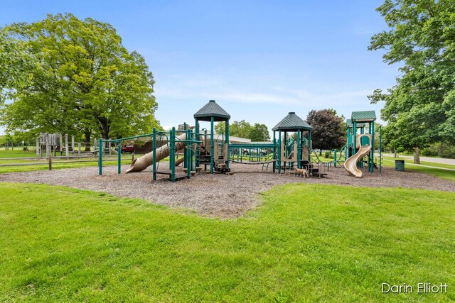 306 W Russell St, Hubbardston, MI 48845 - community play area with a lawn