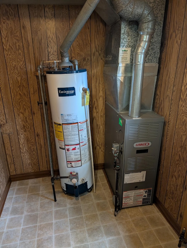 157 S Kenwood St, Muskegon, MI 49442 - utility room with water heater and heating unit