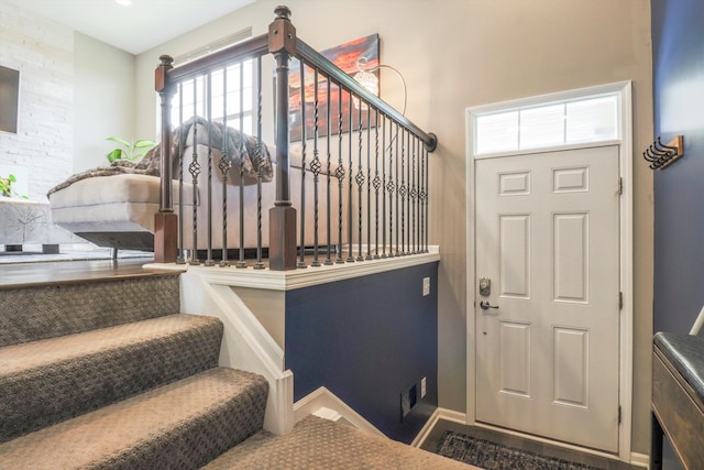 2605 Helmsdale Cir, Rochester, MI 48307 - stairs featuring plenty of natural light, carpet flooring, and baseboards