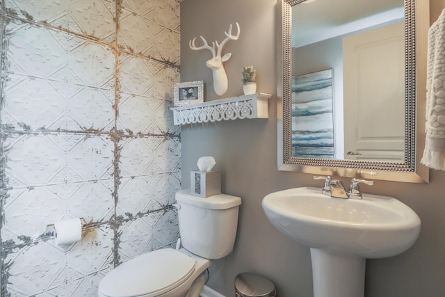 2605 Helmsdale Cir, Rochester, MI 48307 - bathroom with toilet and a sink