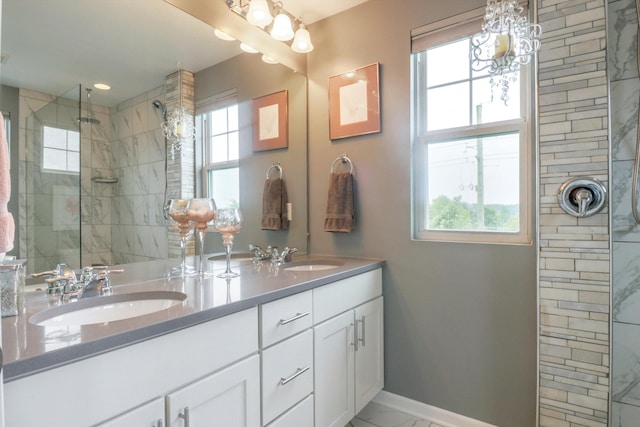 2605 Helmsdale Cir, Rochester, MI 48307 - bathroom featuring plenty of natural light, double vanity, and tiled shower