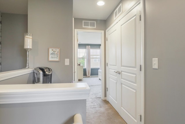 2605 Helmsdale Cir, Rochester, MI 48307 - hallway featuring light colored carpet and recessed lighting