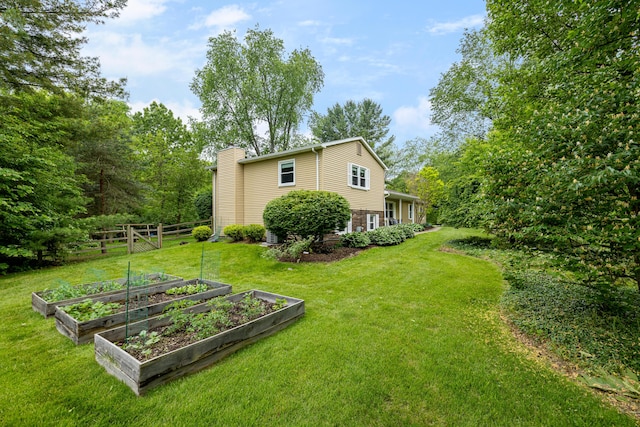 9177 Horseshoe Bnd, Dexter, MI 48130 - view of yard featuring a vegetable garden