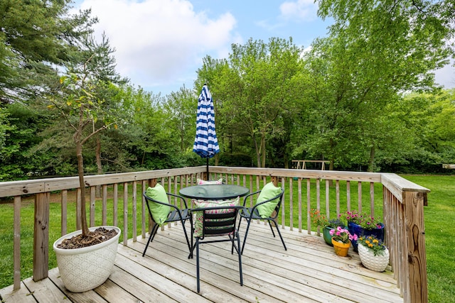 9177 Horseshoe Bnd, Dexter, MI 48130 - wooden deck featuring outdoor dining space and a lawn