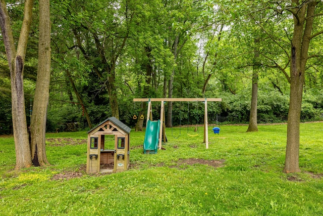 9177 Horseshoe Bnd, Dexter, MI 48130 - view of green lawn featuring a playground