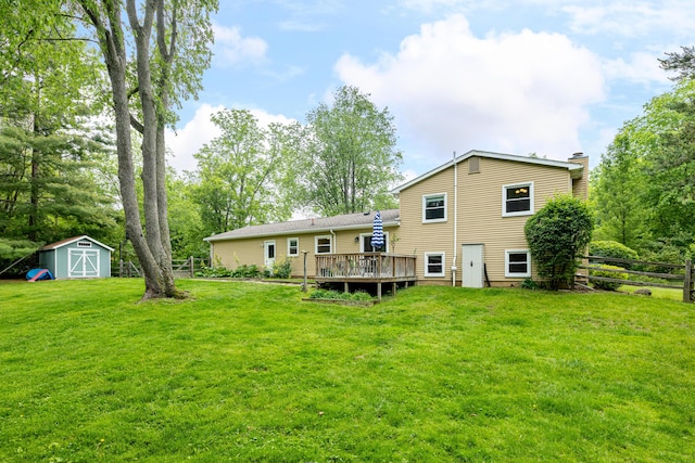 9177 Horseshoe Bnd, Dexter, MI 48130 - back of house featuring a deck and a chimney