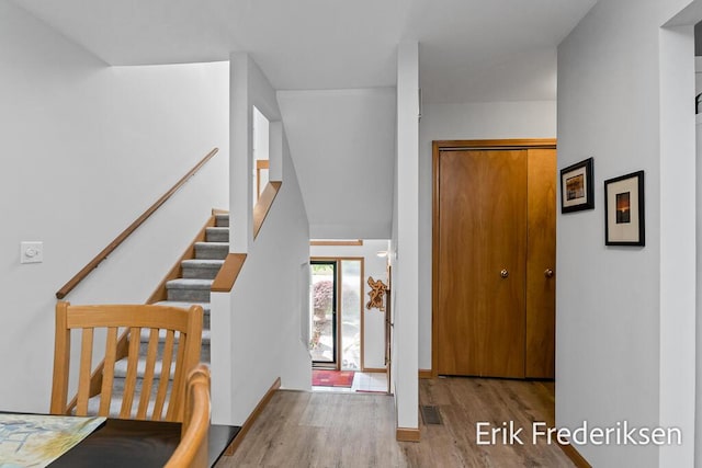 17879 Hidden Dunes Ln Unit D, Spring Lake, MI 49456 - foyer entrance with wood finished floors and stairway