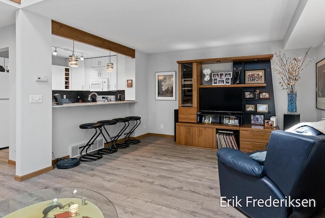 17879 Hidden Dunes Ln Unit D, Spring Lake, MI 49456 - living area with wood finished floors and baseboards