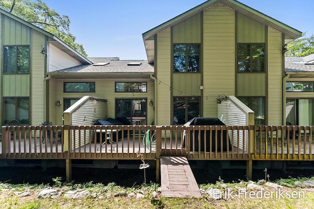 17879 Hidden Dunes Ln Unit D, Spring Lake, MI 49456 - rear view of property with a wooden deck