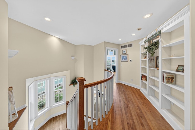 60757 Beechwood Ln, Cassopolis, MI 49031 - hall with an upstairs landing, wood finished floors, and recessed lighting