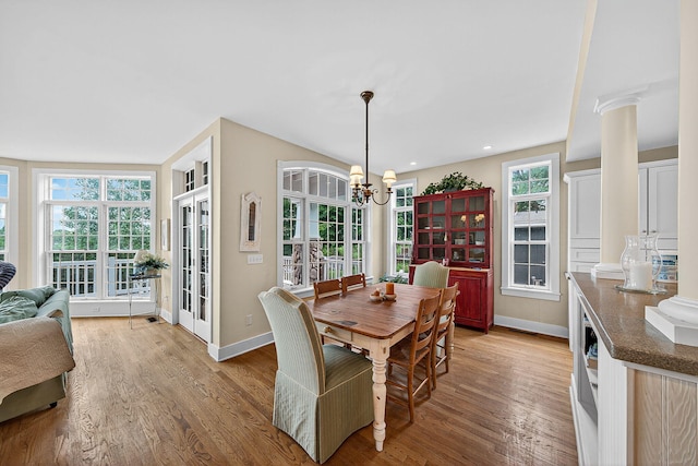 60757 Beechwood Ln, Cassopolis, MI 49031 - dining area with light wood-style floors, a chandelier, and recessed lighting