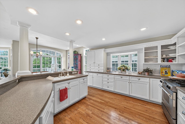 60757 Beechwood Ln, Cassopolis, MI 49031 - kitchen featuring ornate columns, stainless steel range, dark countertops, open shelves, and recessed lighting