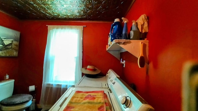 8424 3rd St, Onekama, MI 49675 - bathroom featuring healthy amount of natural light and an ornate ceiling