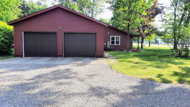 8424 3rd St, Onekama, MI 49675 - view of property exterior featuring a lawn